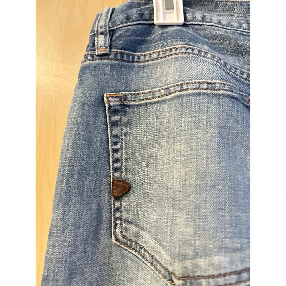 Jacob Davis medium-wash denim jeans featuring a distinct copper-toned 30x34